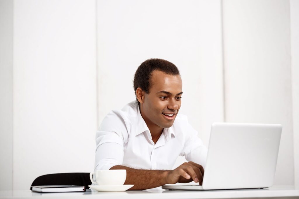 youngman-working-on-a-laptop